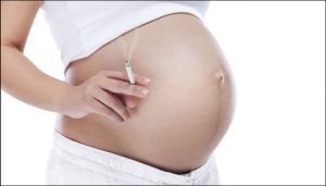 Курение во время беременности может стать причиной потери слуха ребенка